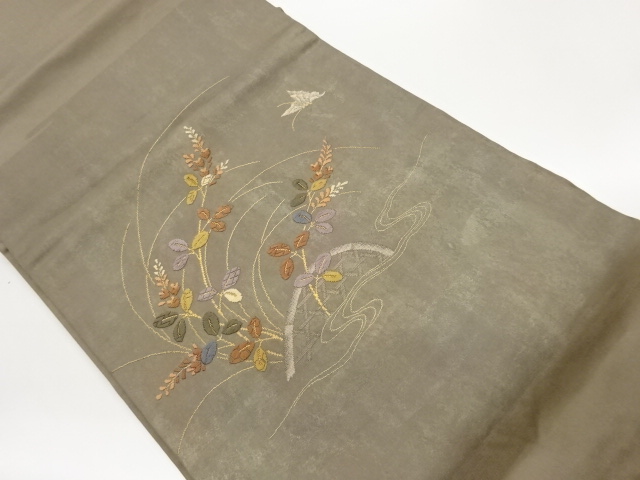 引箔萩に蝶・垣根模様織出し名古屋帯